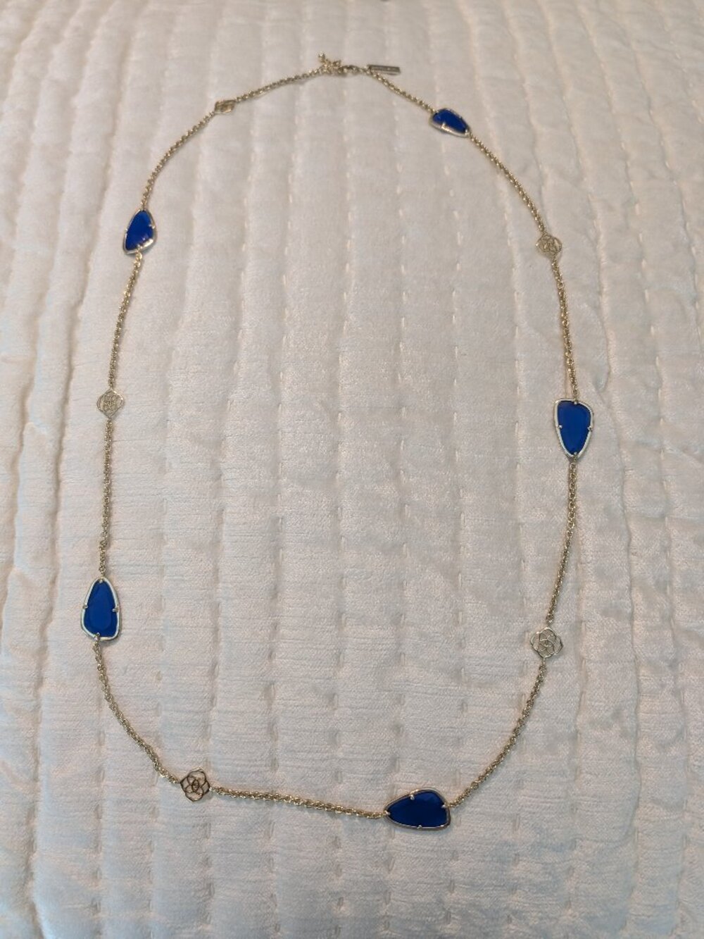 Kendra Scott long necklace with blue stones